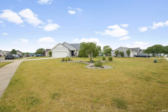 515 Cloudmont Dr, Osceola, IN 46561 - view of front of house with concrete driveway, an attached garage, a front yard, and a residential view