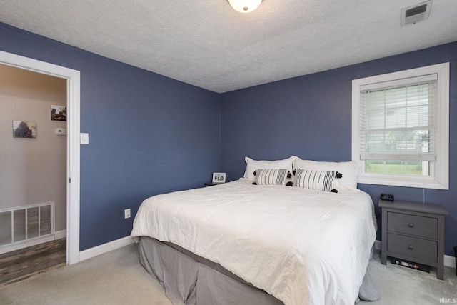 53722 Bittersweet Rd, Mishawaka, IN 46545 - carpeted bedroom featuring baseboards and a textured ceiling