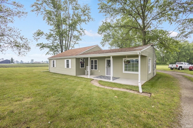 53722 Bittersweet Rd, Mishawaka, IN 46545 - view of front of home featuring a front lawn, a porch, and roof with shingles
