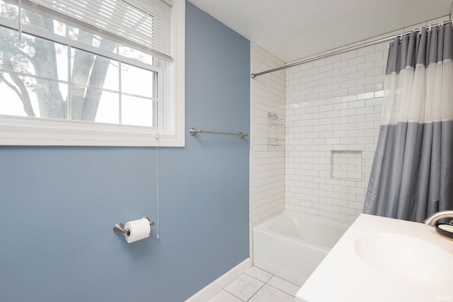 53722 Bittersweet Rd, Mishawaka, IN 46545 - bathroom with baseboards, shower / tub combo, and a sink