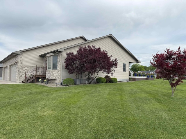 530 W 060 N, Lagrange, IN 46761 - view of property exterior with an attached garage and a yard