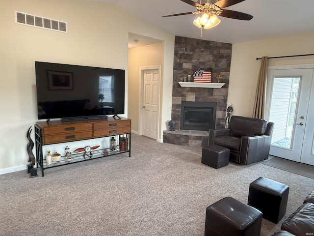 530 W 060 N, Lagrange, IN 46761 - living room featuring lofted ceiling, carpet, a ceiling fan, a fireplace, and baseboards