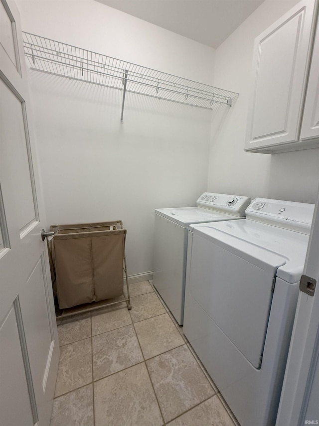 530 W 060 N, Lagrange, IN 46761 - laundry area featuring washing machine and clothes dryer and cabinet space