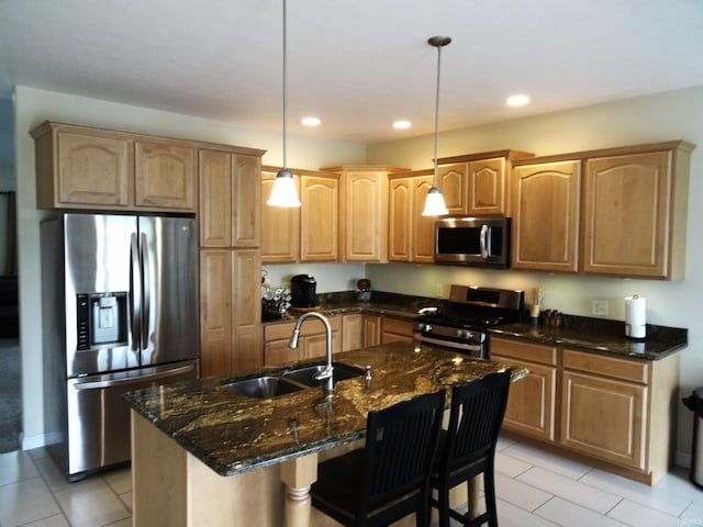 530 W 060 N, Lagrange, IN 46761 - kitchen featuring stainless steel appliances, a sink, dark stone countertops, hanging light fixtures, and recessed lighting
