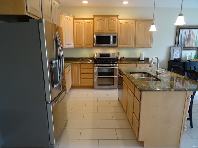 530 W 060 N, Lagrange, IN 46761 - kitchen with stainless steel appliances, light brown cabinetry, a sink, recessed lighting, and a kitchen island with sink