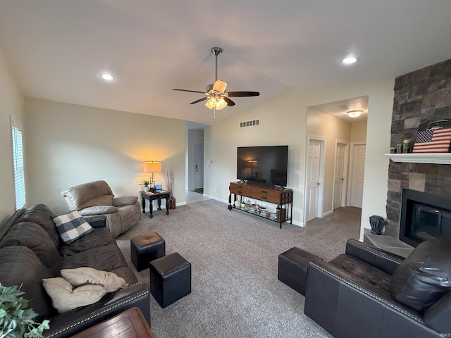 530 W 060 N, Lagrange, IN 46761 - carpeted living area featuring baseboards, a ceiling fan, lofted ceiling, a stone fireplace, and recessed lighting