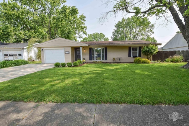 2318 W Concord Rd, Muncie, IN 47304 - single story home featuring driveway and a garage