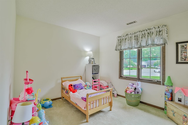 1402 Ivy Ct, North Manchester, IN 46962 - carpeted bedroom featuring baseboards and a textured ceiling
