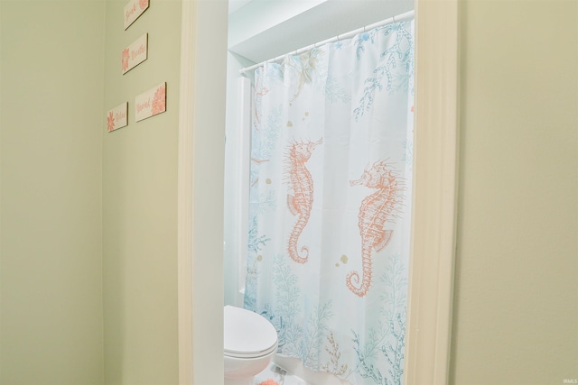 1402 Ivy Ct, North Manchester, IN 46962 - full bathroom featuring toilet and a shower with curtain