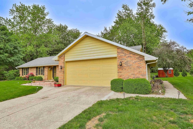 1402 Ivy Ct, North Manchester, IN 46962 - view of front of property with brick siding, a garage, driveway, and a front yard