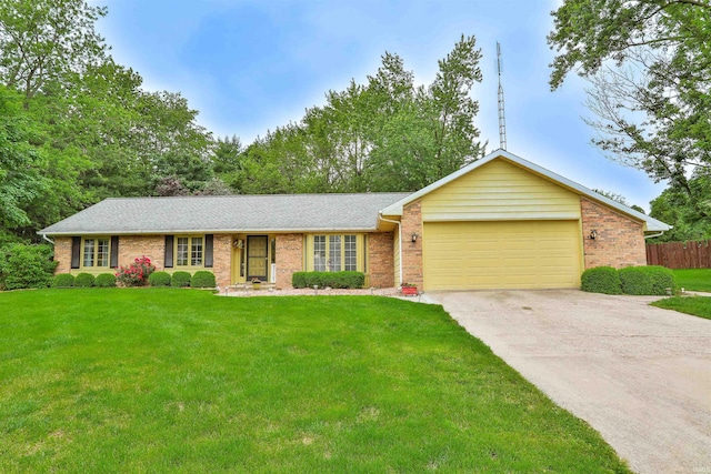 1402 Ivy Ct, North Manchester, IN 46962 - ranch-style home featuring a garage, brick siding, concrete driveway, and roof with shingles
