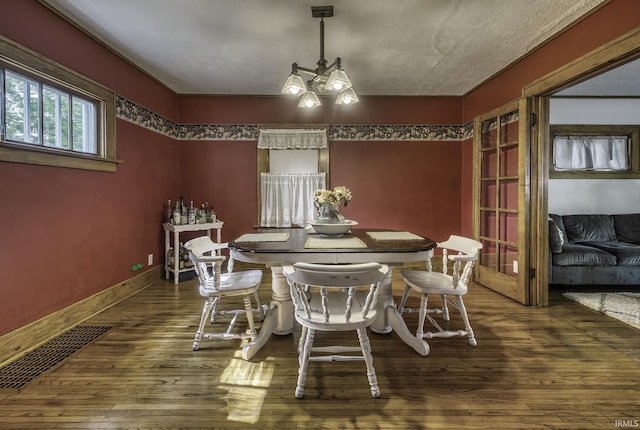 4321 Arlington Ave, Fort Wayne, IN 46807 - dining room featuring hardwood / wood-style floors and baseboards