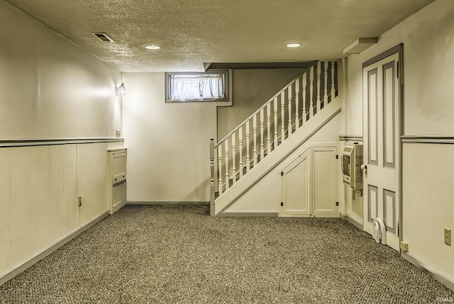 4321 Arlington Ave, Fort Wayne, IN 46807 - below grade area featuring carpet floors, a textured ceiling, stairs, and recessed lighting