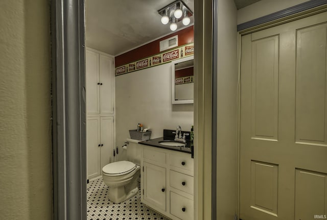 4321 Arlington Ave, Fort Wayne, IN 46807 - bathroom with vanity, toilet, and tile patterned flooring