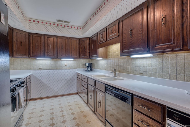 6888 Miller Ln, Newburgh, IN 47630 - kitchen featuring dishwasher, a sink, range, light floors, and light countertops