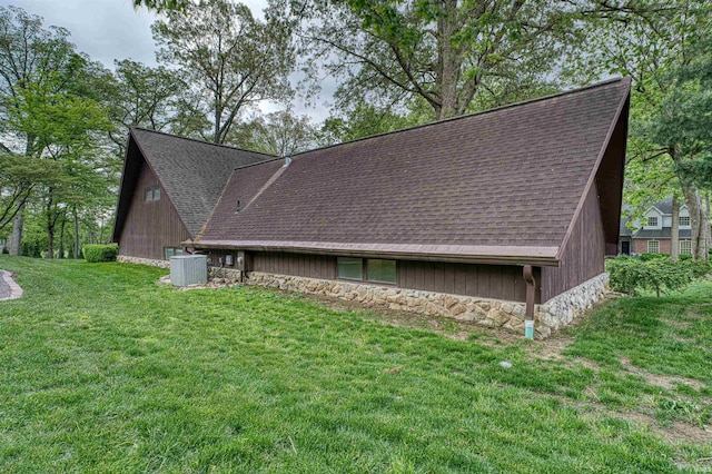 6888 Miller Ln, Newburgh, IN 47630 - view of side of property with roof with shingles, stone siding, a yard, and cooling unit