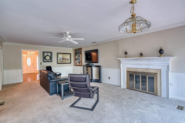 6888 Miller Ln, Newburgh, IN 47630 - living room featuring carpet, a chandelier, wainscoting, ornamental molding, and a ceiling fan