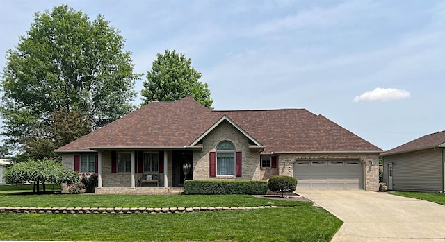 1976 Oak St, Linton, IN 47441 - single story home with an attached garage, brick siding, driveway, and a front yard