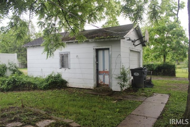135 S Broad St, Dunkirk, IN 47336 - view of home's exterior featuring a shingled roof