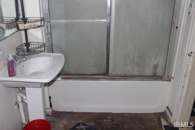 135 S Broad St, Dunkirk, IN 47336 - bathroom featuring shower / bath combination with glass door and a sink
