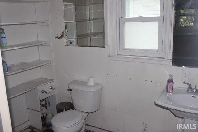 135 S Broad St, Dunkirk, IN 47336 - half bathroom with toilet and plenty of natural light