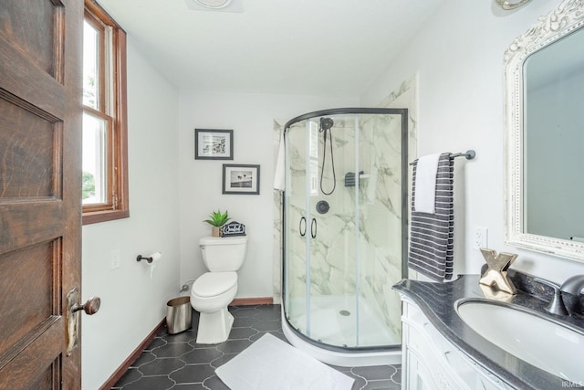201 S 11th St, New Castle, IN 47362 - bathroom featuring toilet, vanity, a marble finish shower, and baseboards