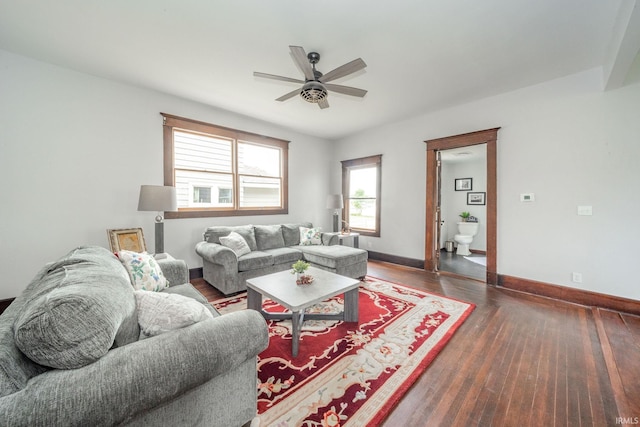 201 S 11th St, New Castle, IN 47362 - living room featuring a ceiling fan, wood finished floors, and baseboards