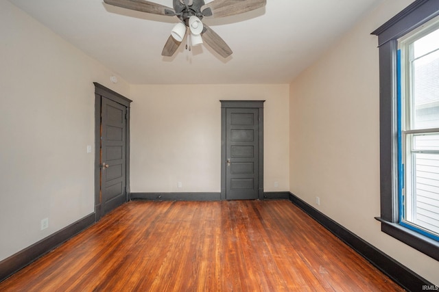 201 S 11th St, New Castle, IN 47362 - empty room with hardwood / wood-style floors, baseboards, and ceiling fan