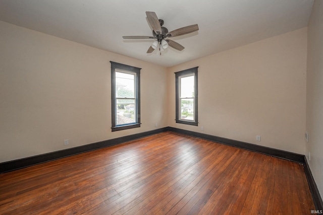 201 S 11th St, New Castle, IN 47362 - empty room with hardwood / wood-style flooring, baseboards, and a ceiling fan