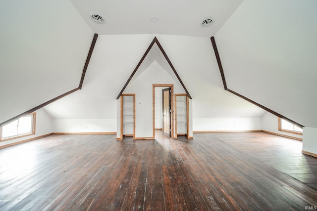 201 S 11th St, New Castle, IN 47362 - additional living space featuring hardwood / wood-style floors, lofted ceiling, and baseboards