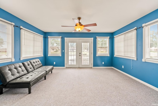 722 Biscayne Ave, Warsaw, IN 46580 - living room featuring baseboards, ceiling fan, plenty of natural light, and french doors