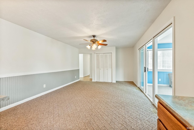 722 Biscayne Ave, Warsaw, IN 46580 - unfurnished room with ceiling fan, light colored carpet, and baseboards