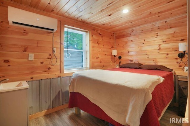 0 Creekview Ln, Cannelton, IN 47520 - bedroom with a wall mounted air conditioner, wooden ceiling, wood finished floors, and wooden walls