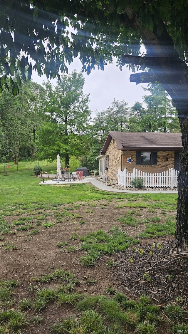 2477 W 50th Rd N, Princeton, IN 47670 - view of yard featuring a patio