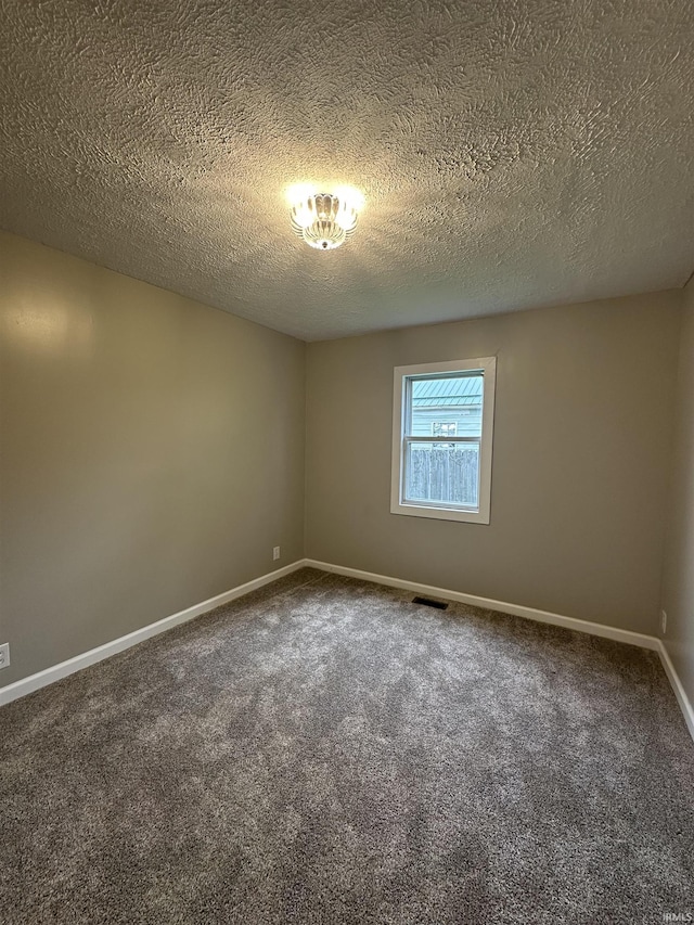 360 NE C St, Linton, IN 47441 - unfurnished room featuring carpet flooring, baseboards, and a textured ceiling