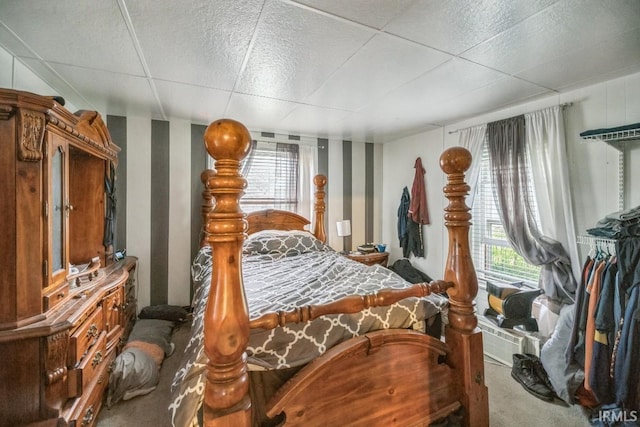 1226 Kinyon St, South Bend, IN 46616 - carpeted bedroom with wallpapered walls