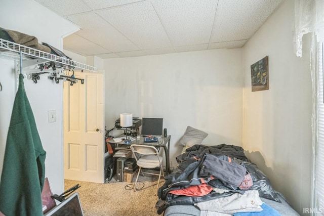 1226 Kinyon St, South Bend, IN 46616 - bedroom with carpet floors, a drop ceiling, and a desk