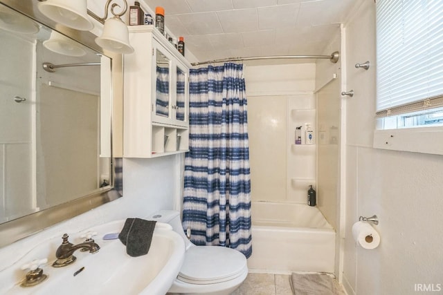 1226 Kinyon St, South Bend, IN 46616 - bathroom with shower / bathtub combination with curtain, toilet, a sink, and tile patterned flooring