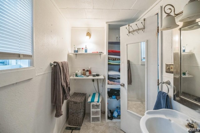1226 Kinyon St, South Bend, IN 46616 - bathroom with a sink and a textured wall