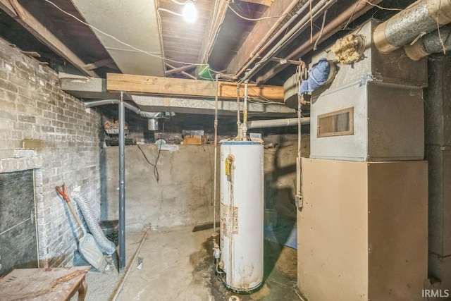 1226 Kinyon St, South Bend, IN 46616 - unfinished below grade area featuring water heater and heating unit