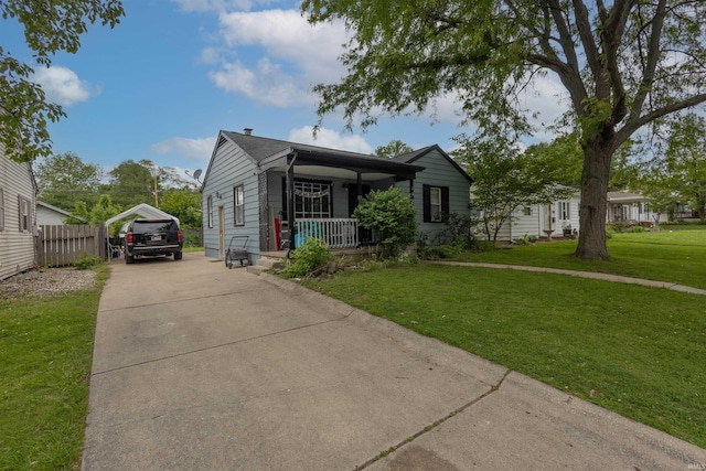 1310 Sinton Ave, Lafayette, IN 47905 - view of front facade featuring covered porch and concrete driveway