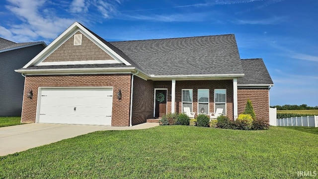 13224 Prairie Dr, Evansville, IN 47725 - craftsman-style house featuring a garage, driveway, brick siding, and roof with shingles