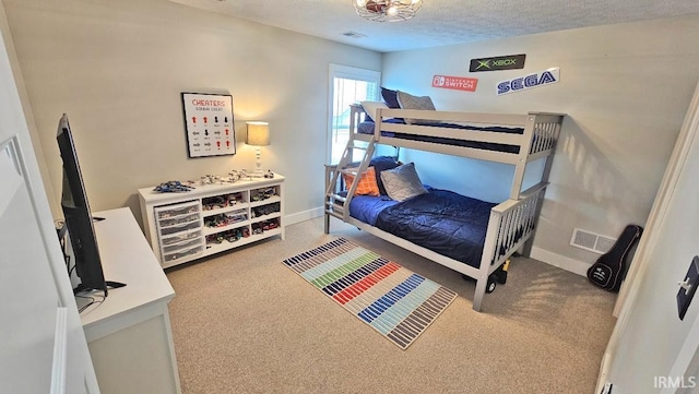 13224 Prairie Dr, Evansville, IN 47725 - carpeted bedroom featuring baseboards and a textured ceiling