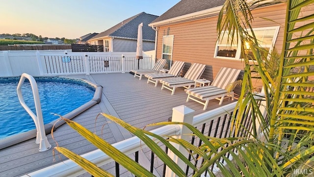 13224 Prairie Dr, Evansville, IN 47725 - pool at dusk featuring a wooden deck