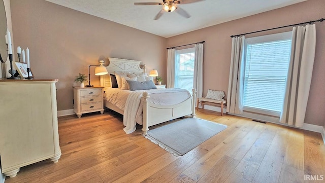 13224 Prairie Dr, Evansville, IN 47725 - bedroom with wood-type flooring, baseboards, and a ceiling fan