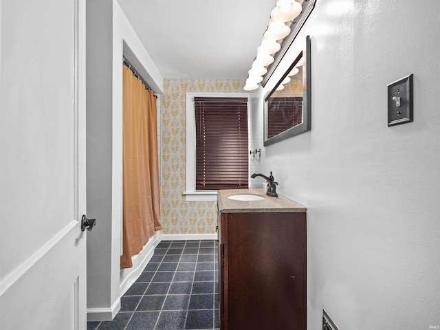 336 Arcadia Ct, Fort Wayne, IN 46807 - full bathroom with vanity, wallpapered walls, baseboards, curtained shower, and tile patterned flooring