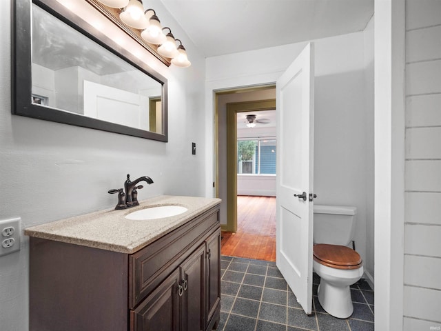 336 Arcadia Ct, Fort Wayne, IN 46807 - bathroom featuring vanity, toilet, and tile patterned floors