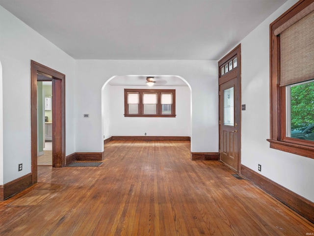 336 Arcadia Ct, Fort Wayne, IN 46807 - entrance foyer featuring arched walkways, hardwood / wood-style flooring, and baseboards