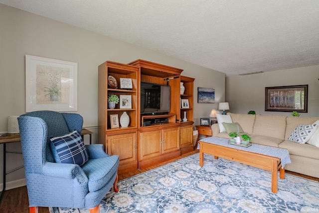 4635 S Bellamy Blvd, Marion, IN 46953 - living area featuring wood finished floors and a textured ceiling