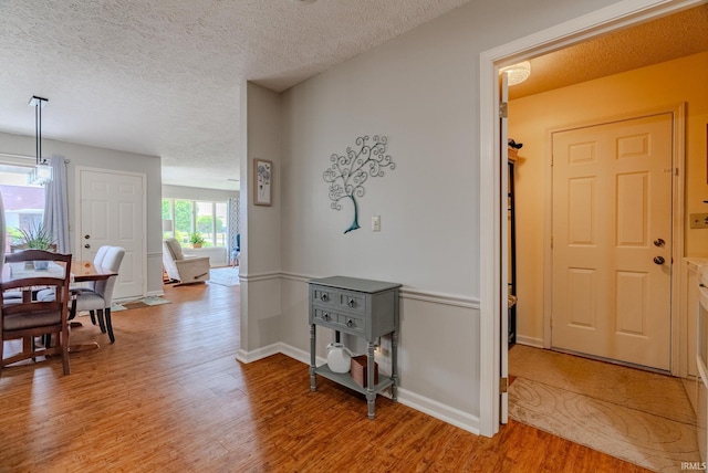 4635 S Bellamy Blvd, Marion, IN 46953 - hallway featuring light wood finished floors and a textured ceiling